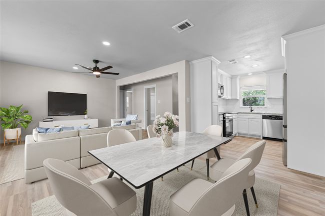 Dining space with recessed lighting, light wood-style floors, and a ceiling fan | Image 4