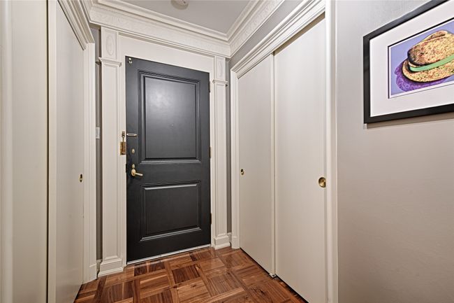 Front doorway to outside featuring ornamental molding | Image 20