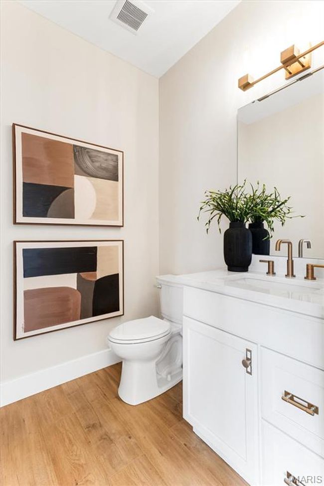 Convenient, roomy powder room for your guests! | Image 14