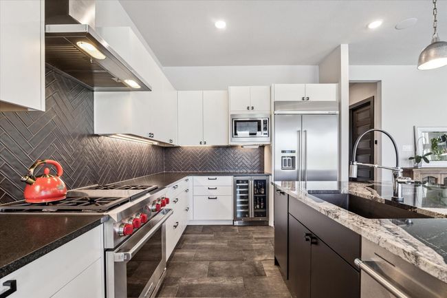 Professional Wolf dual oven/range for the cooks. | Image 12