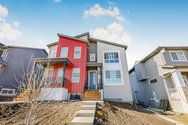 21 Herron Mews Ne, Home with 4 bedrooms, 3 bathrooms and 2 parking in Calgary AB | Image 1