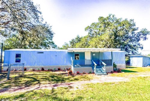 688 4th St, POLK CITY, FL, 33868-9052 | Card Image