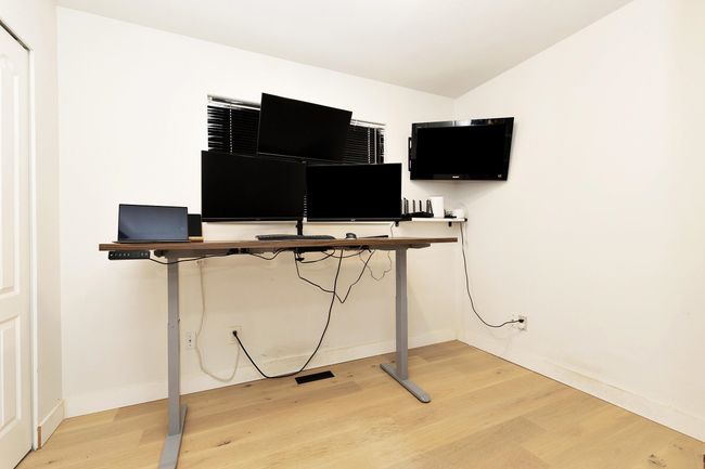 Main floor bedroom, currently used as an office. | Image 26
