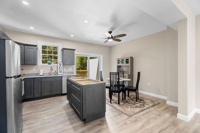 Opt to keep a dining table or go with just the newest trend of kitchen island seats only when you bring in your own furnishing touches | Image 5