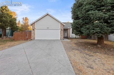 6555 Turkey Tracks Road, House other with 4 bedrooms, 3 bathrooms and 2 parking in Colorado Springs CO | Image 2