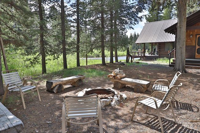 View of yard with an outdoor fire pit | Image 24