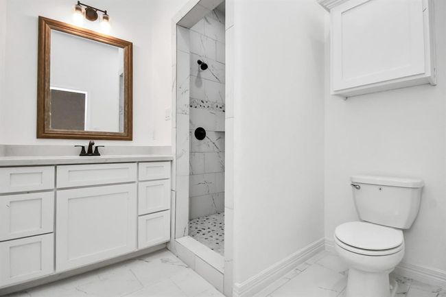 3rd full bath that is located in 4th bedroom | Image 14