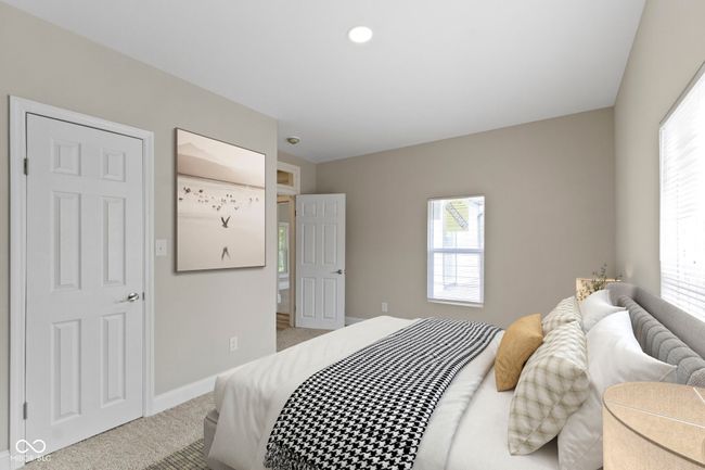 digitally staged, carpeted bedroom with multiple windows, baseboards, and recessed lighting | Image 30