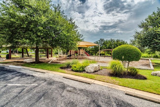 Located in a desirable community offering a variety of amenities including [community pool, playground, walking trails, clubhouse, or other features], residents enjoy a vibrant neighborhood lifestyle with convenient access to nearby schools, shopping, and dining. | Image 26