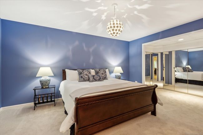 Lower level bedroom with tons of closets. | Image 31