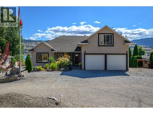 7185 Old Kamloops Rd, House with 3 bedrooms, 3 bathrooms and 2 parking in Vernon BC | Card Image