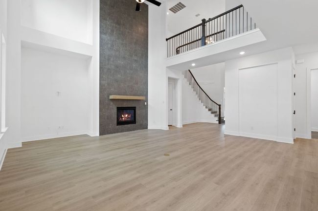 Family Room with soaring ceiling & fireplace | Image 18
