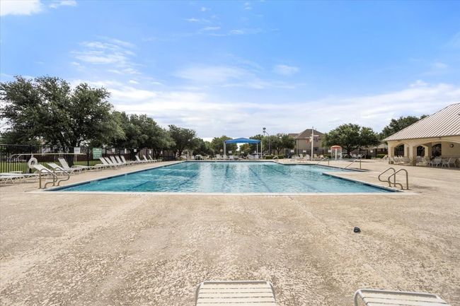 Community pool featuring a patio area | Image 27