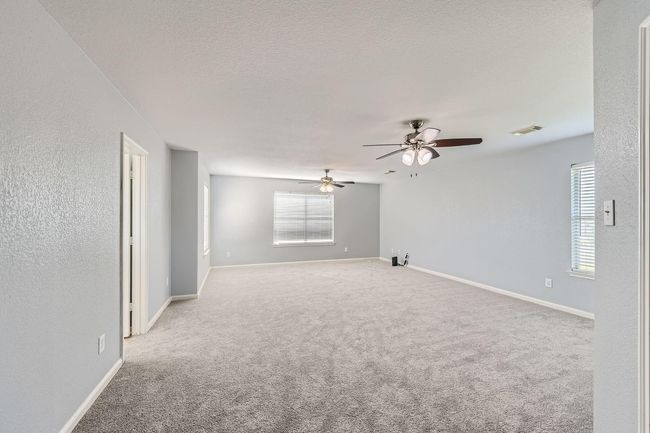 Giant second-floor primary bedroom suite with a walk-in closet and en suite bathroom. | Image 14