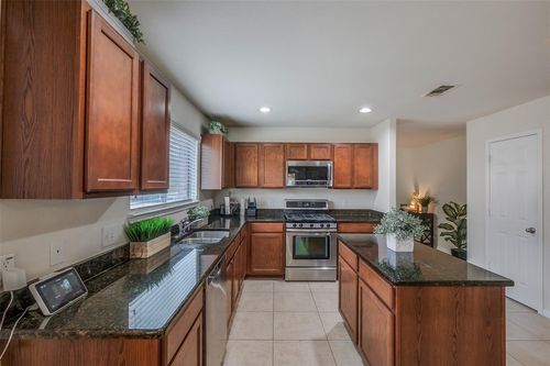 1015 Honeysuckle Vine Dr, Rosenberg, TX, 77469-4860 | Card Image