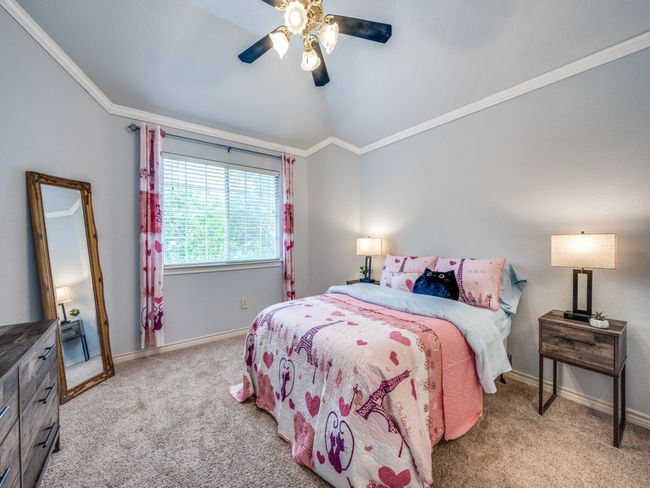 Carpeted bedroom featuring ornamental molding and a ceiling fan | Image 24