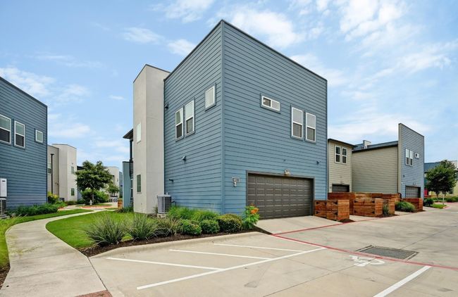 The attached 2-car garage provides plenty of storage and parking space, offering easy access to the home while keeping your vehicles safe and secure | Image 25