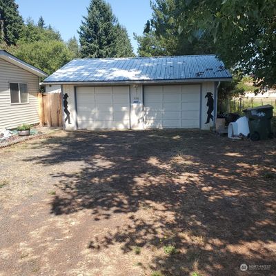 2 car garage w/shop space in back | Image 3