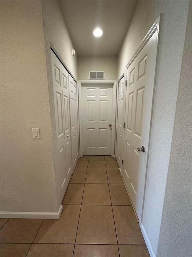 Hall to Bedroom #2, bathroom #2 and Laundry Room | Image 5