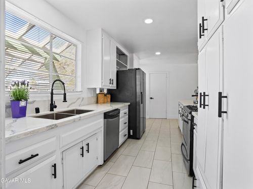 1112 E Avenue J4, Lancaster, CA, 93535-3928 | Card Image