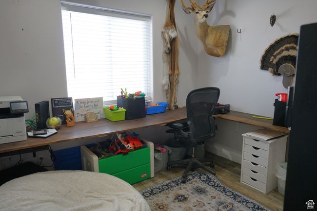 Office space with wood finished floors | Image 28