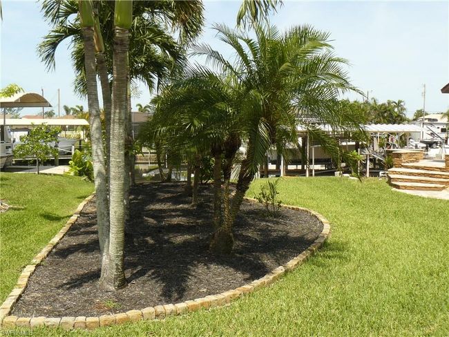 12321 Moon Shell Dr, House other with 3 bedrooms, 3 bathrooms and 2 parking in MATLACHA ISLES FL | Image 45