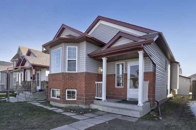 66 Saddlemont Way Ne, Home with 5 bedrooms, 2 bathrooms and 4 parking in Calgary AB | Image 3