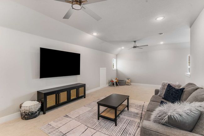 This upstairs Family Room has enough space to create a 5th Bedroom and still have a game room! | Image 29
