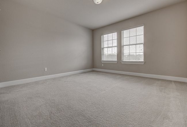 Unfurnished room featuring baseboards and light colored carpet | Image 19