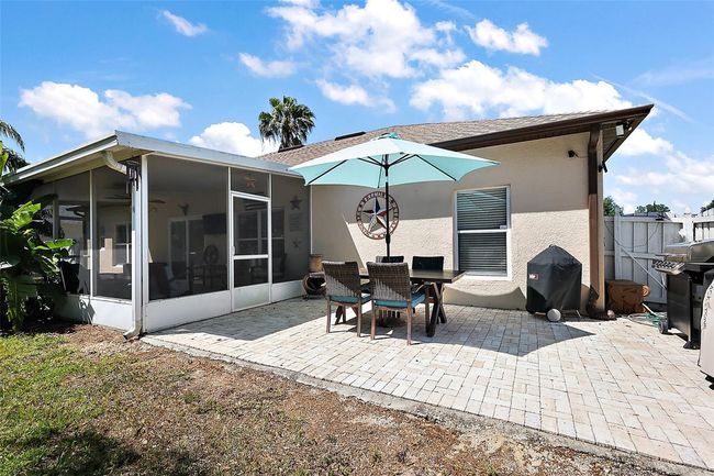 Enjoy additional entertainment space on the paver lanai | Image 26