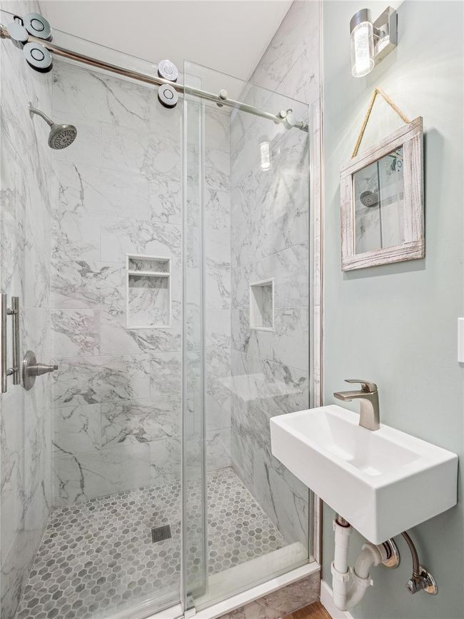 Full guest bathroom with radiant floor heating | Image 17