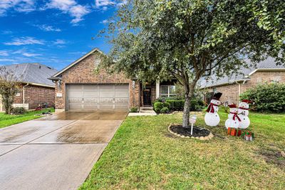 Welcome home to 8302 Solitude Hill Lane, a 2, 325 sq.ft. single-story design with 3 bedrooms and 2 full bathrooms, plus a private study, formal dining room, game room, and more. | Image 1