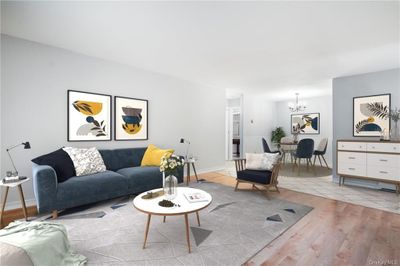 Spacious Living Room With A View Of Your Dining Area. Virtually Staged | Image 1