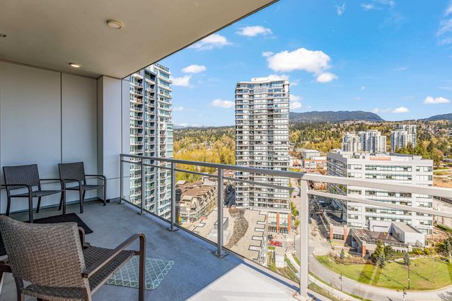 Balcony featuring a city view and a mountain view | Image 25