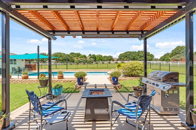 Patio with view of the pool | Image 35