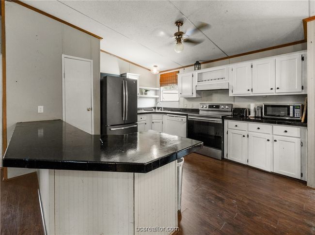 7465 River Oaks Dr, House other with 3 bedrooms, 2 bathrooms and null parking in Iola TX | Image 15
