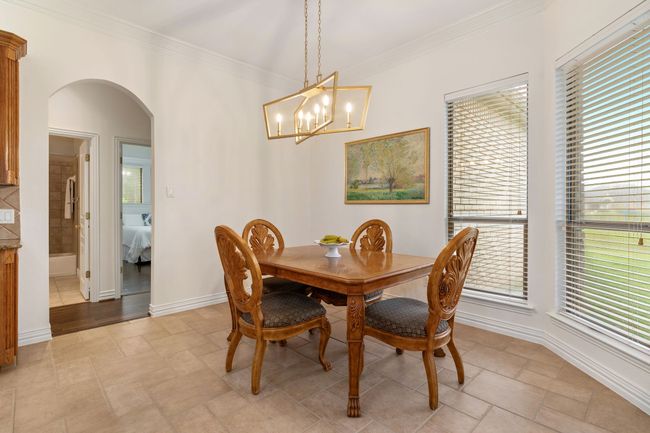 Breakfast room overlooking backyard & patio! | Image 11