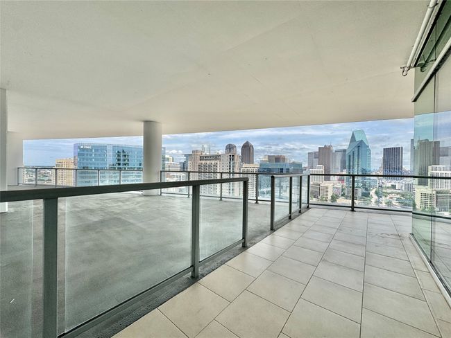 Balcony featuring a view of skyline | Image 14