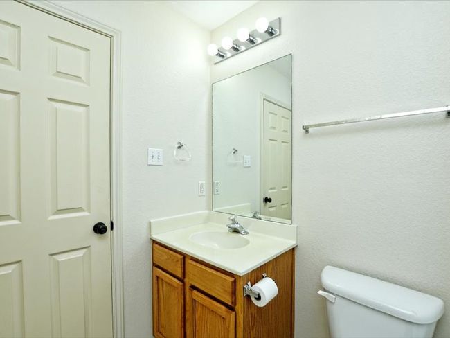 Half bath featuring toilet and vanity | Image 21