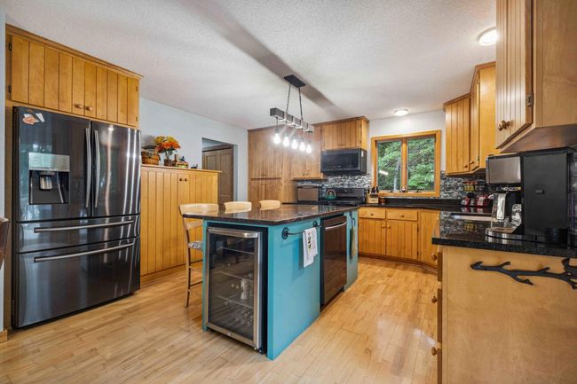 center island with wine cooler | Image 8