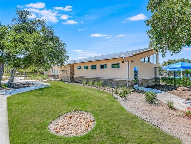Rear view of house with stone siding and stucco siding | Image 37