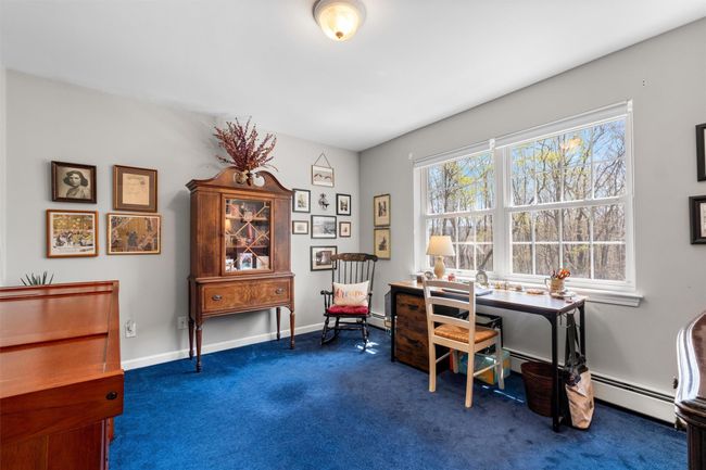Bedroom #2, currently being used as an office. Carpet, lots of windows. | Image 22