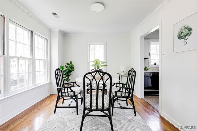 Dining Area with hardwood floors and lots of natural light. | Image 7