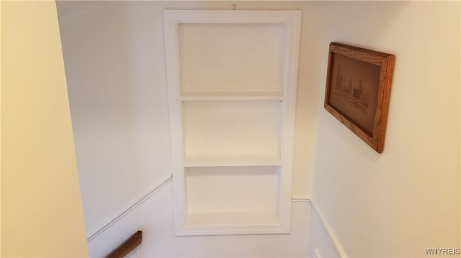 the pull away shelves gives access to the crawl space | Image 24