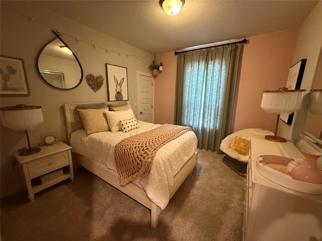 Bedroom featuring carpet floors | Image 7