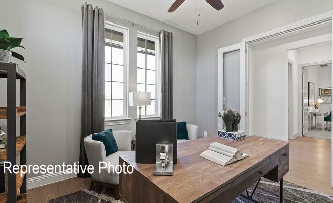 Office space with a ceiling fan and wood finished floors | Image 10