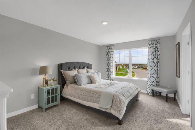 The additional upper level bedrooms are spacious and have their own walk in closets! Model photos. Options and colors will vary. | Image 25