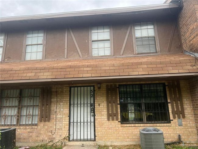 Property entrance featuring brick siding | Image 15
