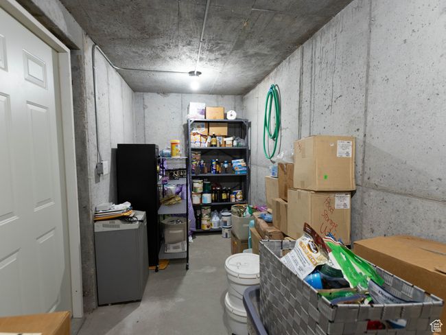 Below grade area featuring refrigerator | Image 34