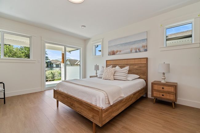 Bedroom with access to exterior and light wood finished floors | Image 18